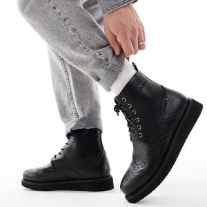 lace up brogue boots in black with wedge sole