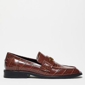 penny loafers in tan faux croc